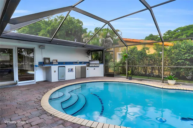 a view of swimming pool with yard