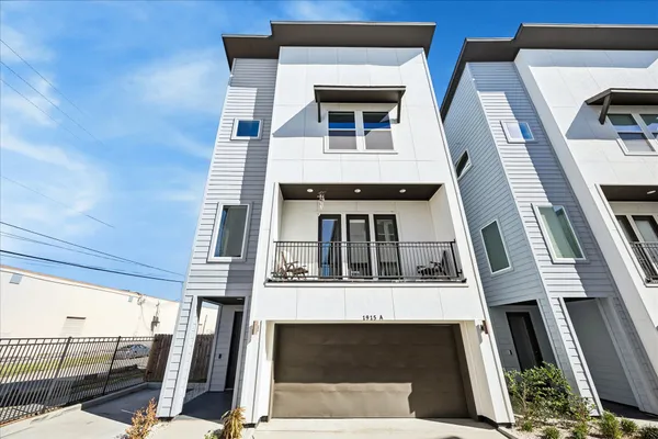 a front view of a house with stairs