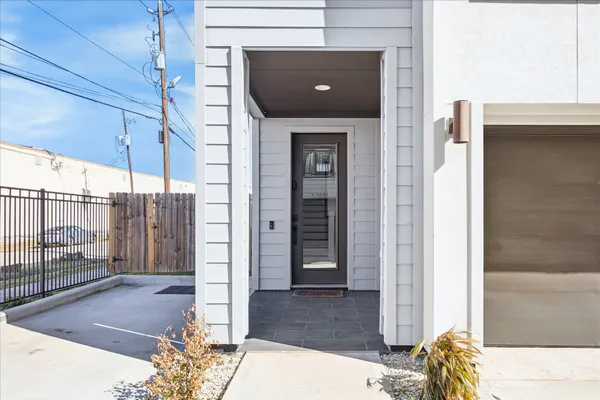 a picture of a house with a balcony