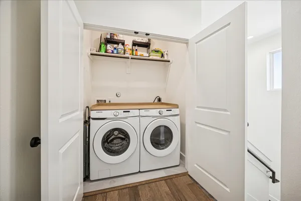 a utility room with dryer and washer