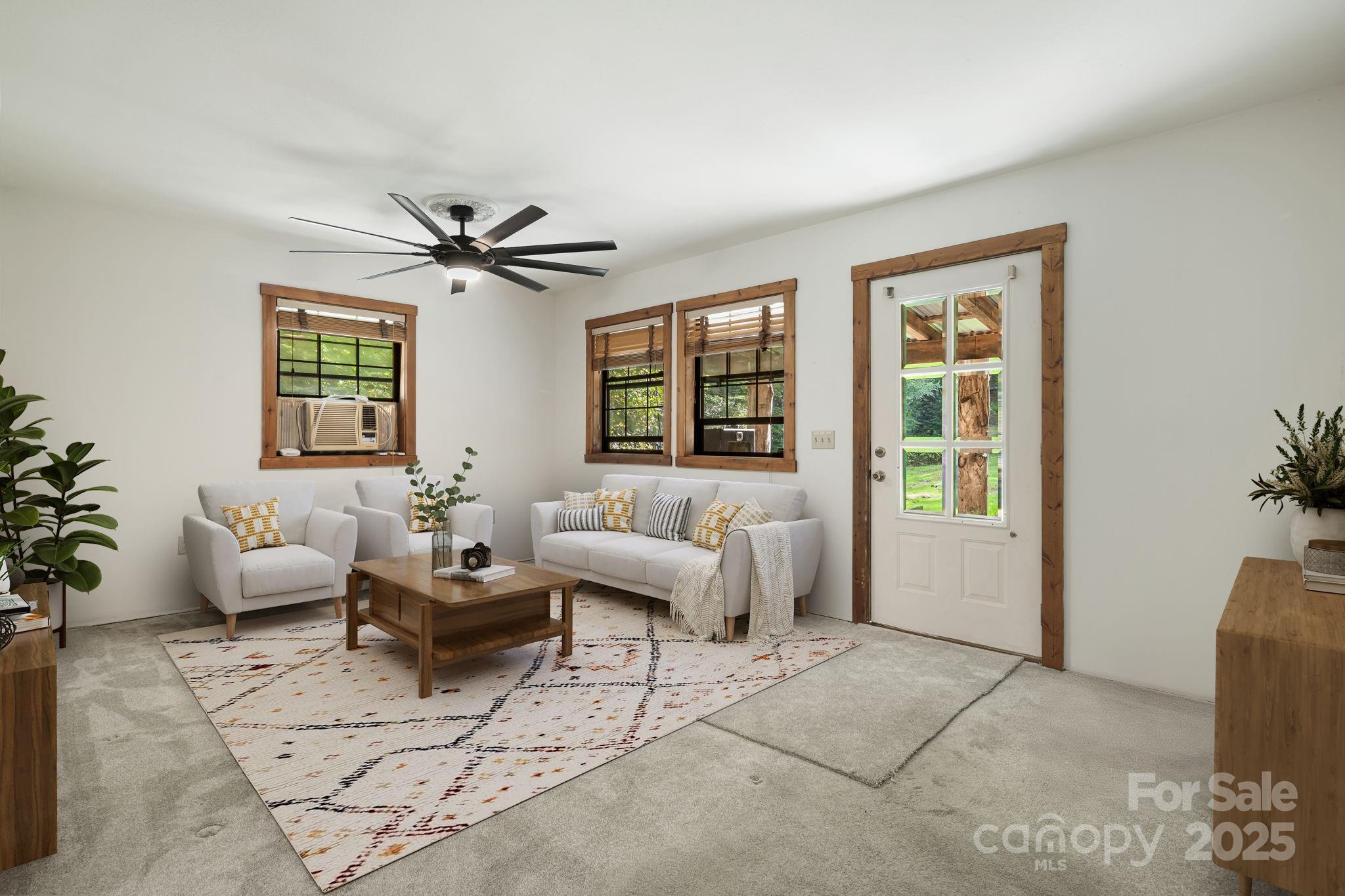 206 Willow Lane Brevard, NC 28712 - Photo 11 of 43 a living room with furniture and window