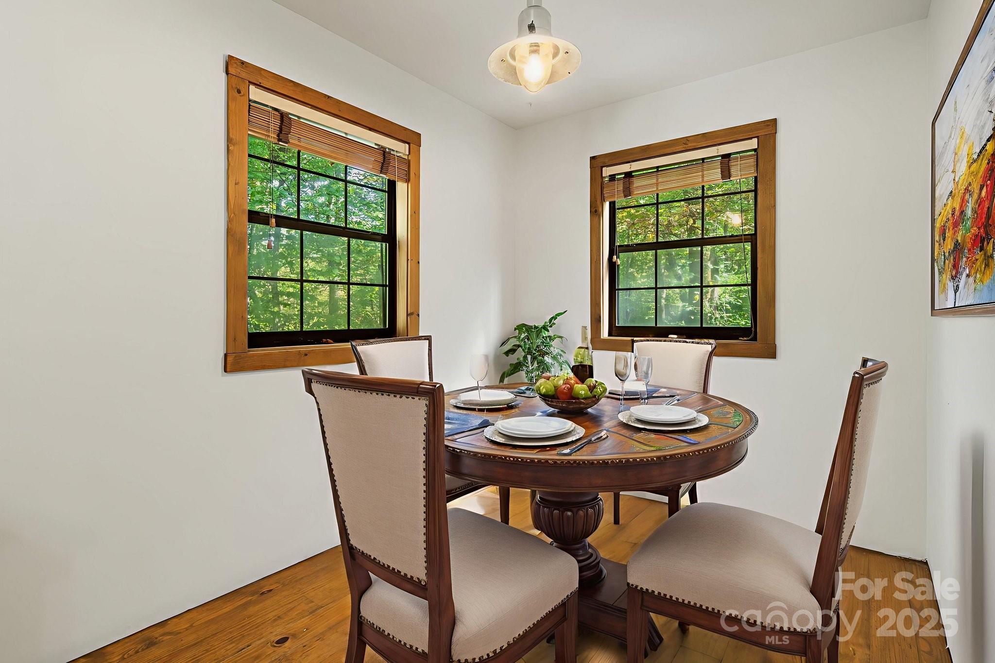 206 Willow Lane Brevard, NC 28712 - Photo 12 of 43 a view of a dining room with furniture and a window