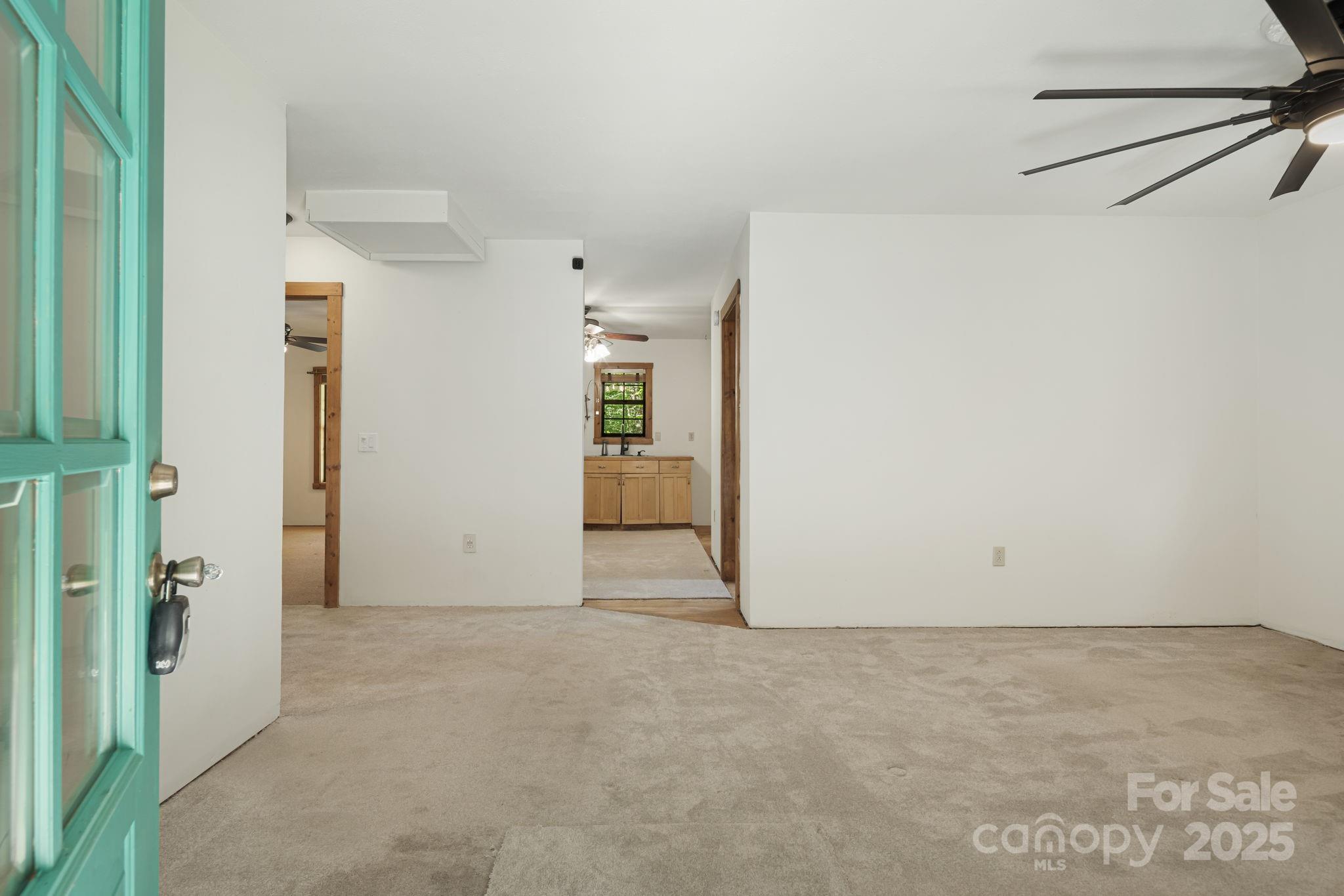 206 Willow Lane Brevard, NC 28712 - Photo 19 of 43 an empty room with an entryway