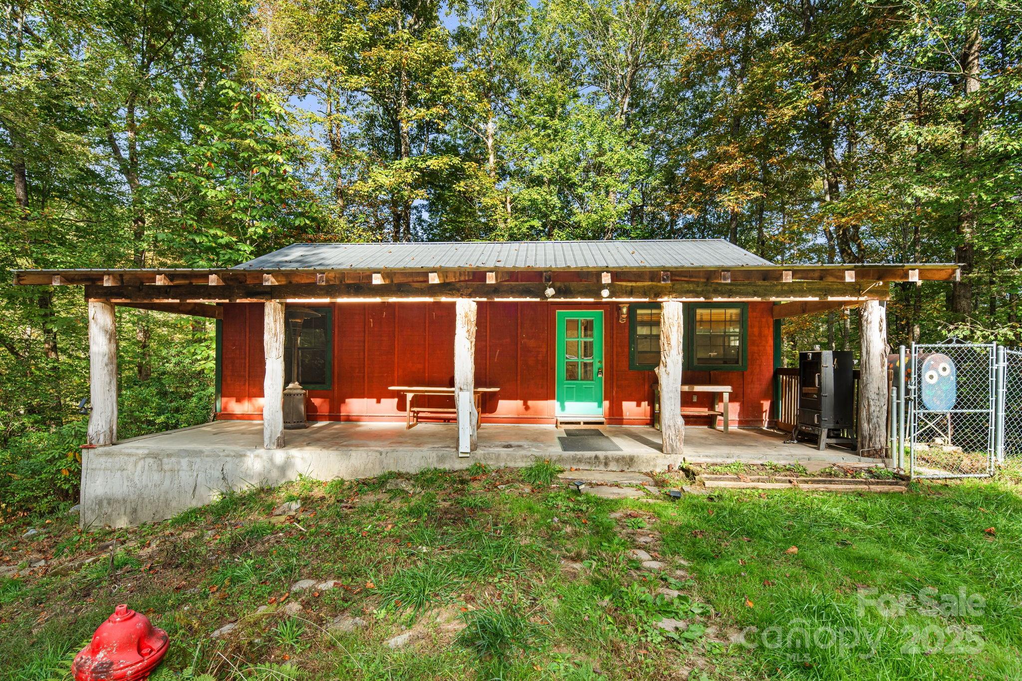 206 Willow Lane Brevard, NC 28712 - Photo 2 of 43 a view of a house with backyard porch and sitting area