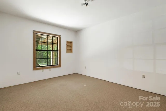 an empty room with a window