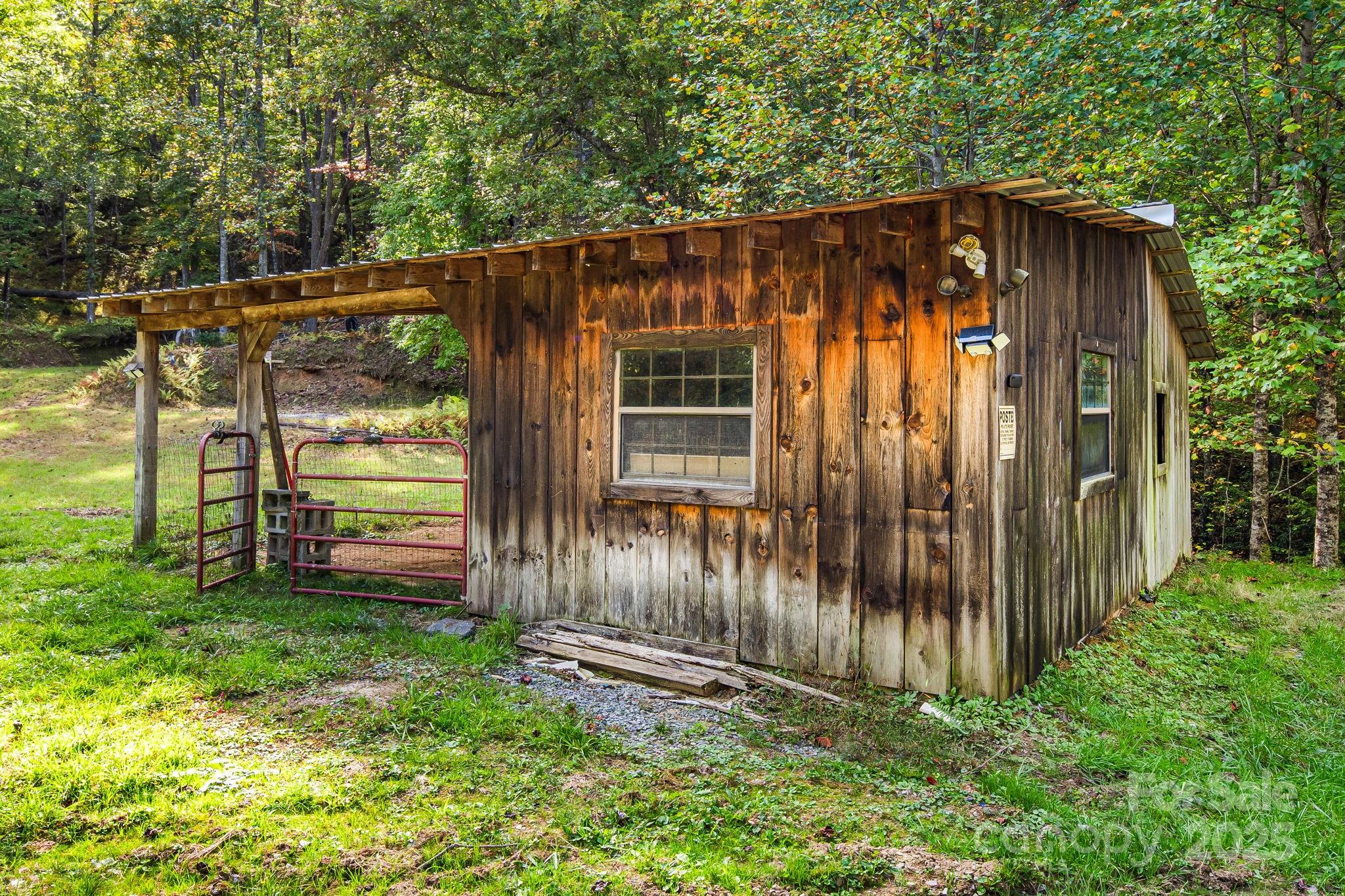 206 Willow Lane Brevard, NC 28712 - Photo 33 of 43 a view of a backyard with wooden fence