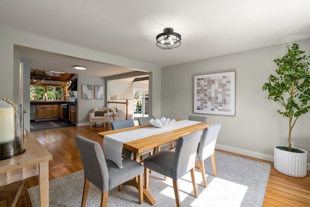 11 Winter Street Foxboro, MA 02035 - Photo 2 of 34 a view of a dining room with furniture and wooden floor