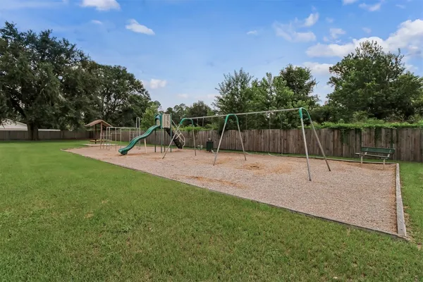 a view of a park with a slide