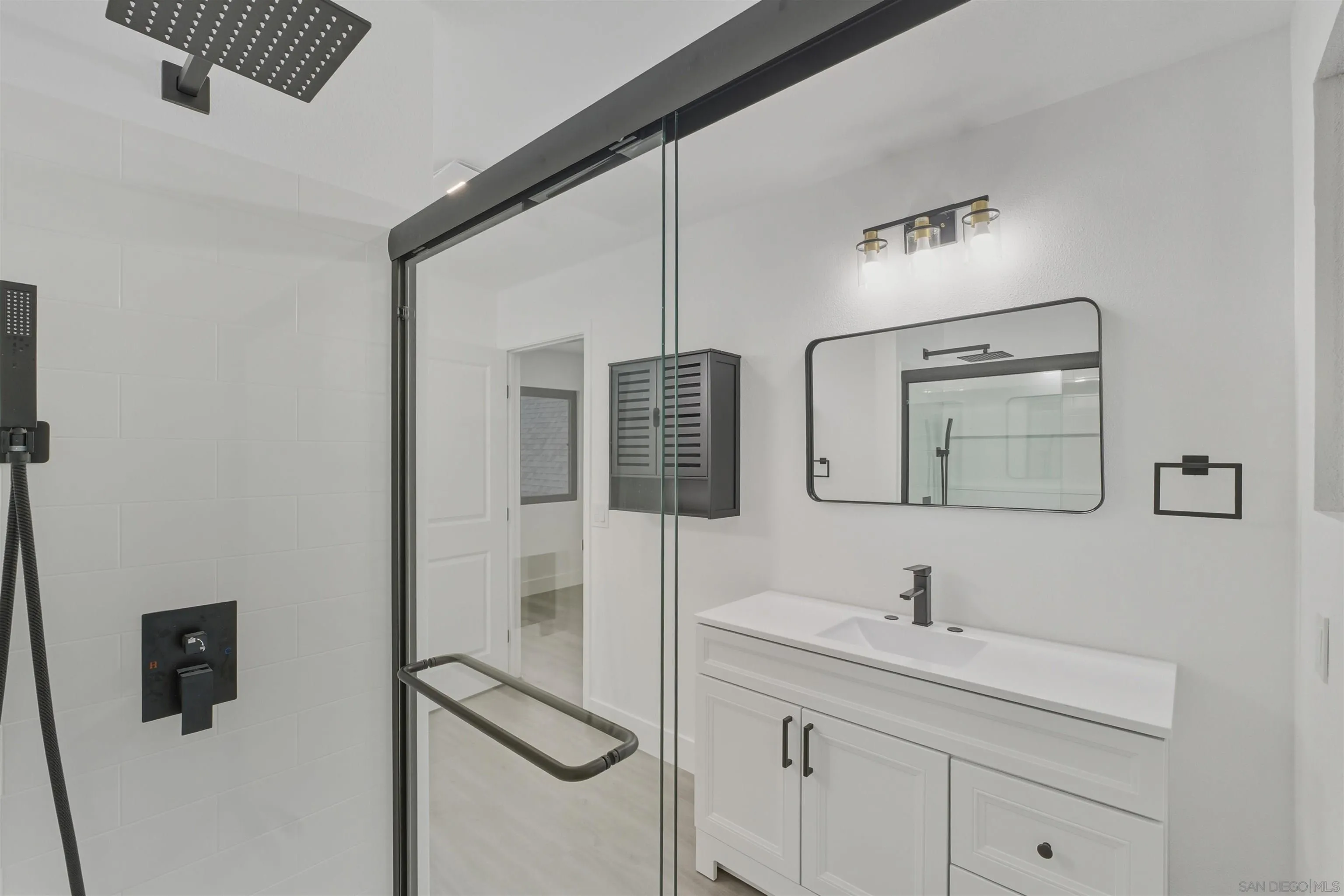 11618 Johnson Lake Road Lakeside, CA 92040 - Photo 13 of 25 a bathroom with a sink and mirror