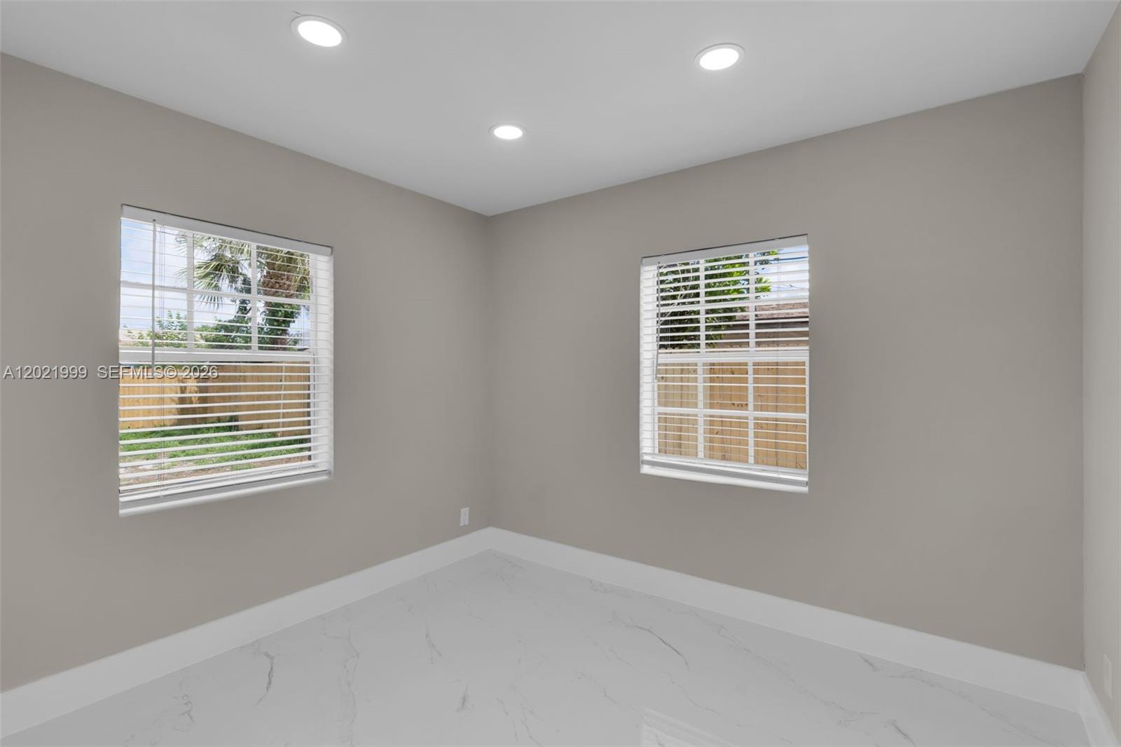 1660 West 26th Street Riviera Beach, FL 33404 - Photo 11 of 28 a view of an empty room with a window