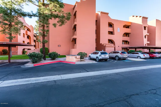 a cars parked in front of a building