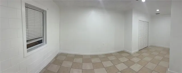 a view of a room with white walls