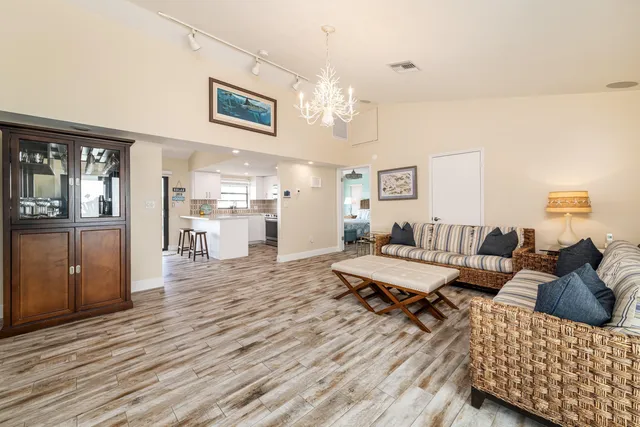 a kitchen with a refrigerator stove and sink