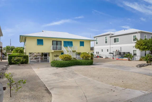 a front view of house with yard