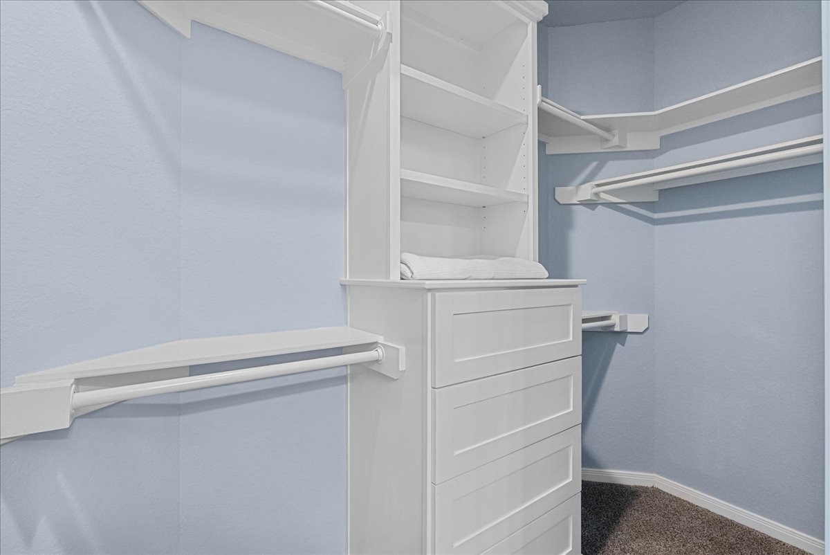 1012D 22nd Street, Unit D Dickinson, TX 77539 - Photo 21 of 44 a view of walk in closet with empty racks