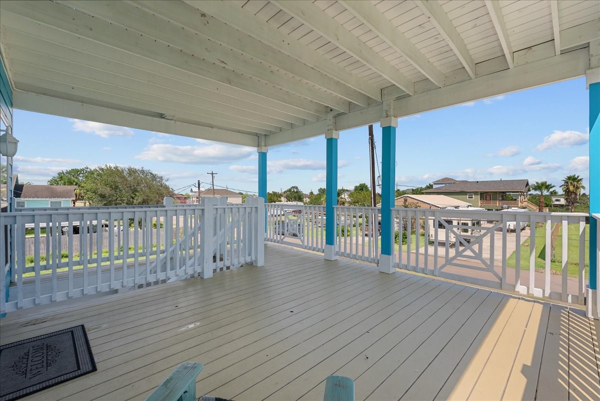1012D 22nd Street, Unit D Dickinson, TX 77539 - Photo 22 of 44 a view of a balcony with wooden floor