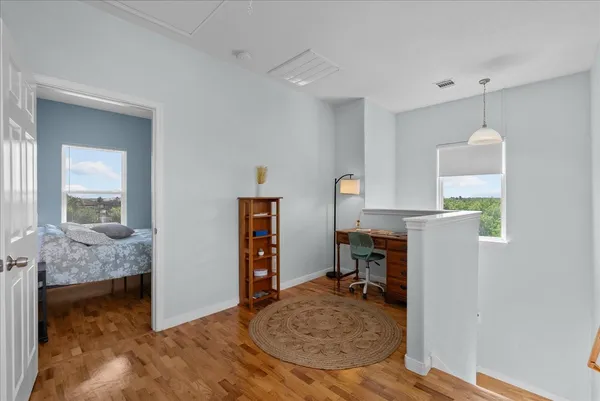 a workspace with furniture and a dresser
