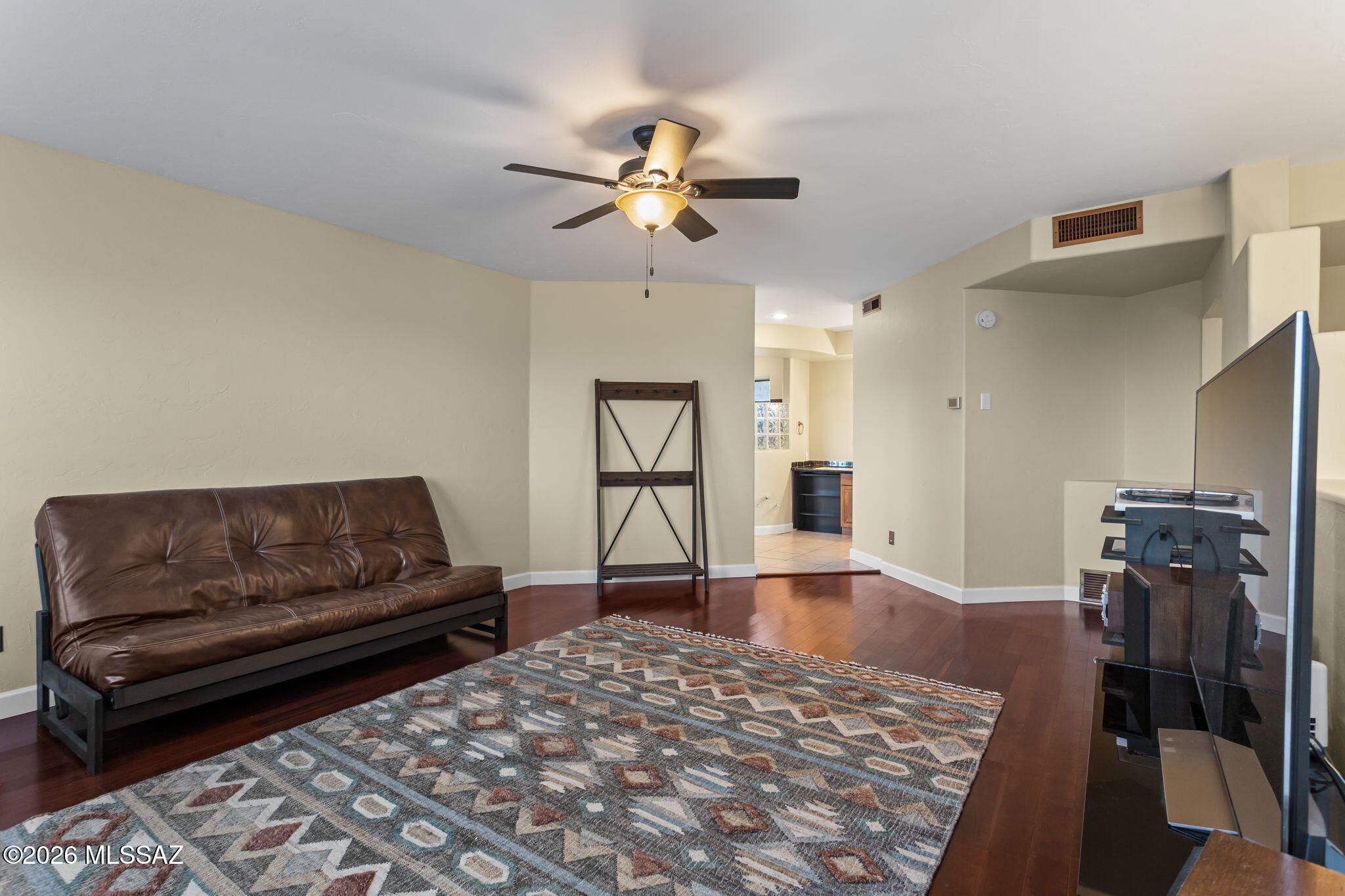 4210 West Mossman Road Tucson, AZ 85746 - Photo 19 of 51 a living room with furniture and a rug