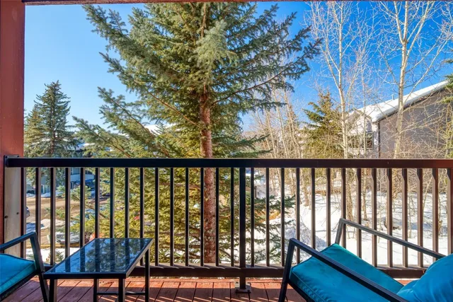 a view of balcony with furniture