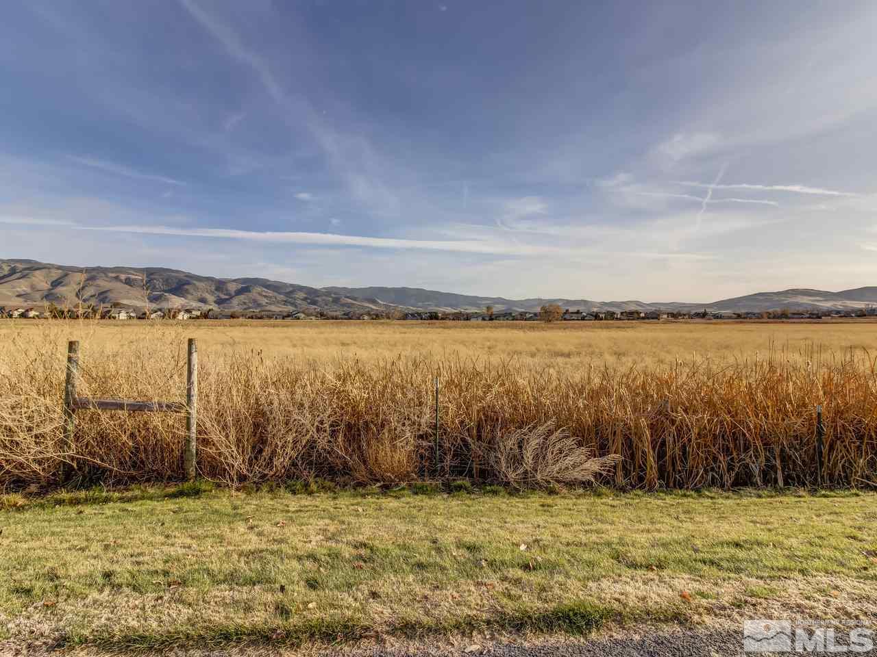 900 South, Unit 3714 Reno, NV 89521 - Photo 18 of 23 a view of a ocean with a large mountain in the background