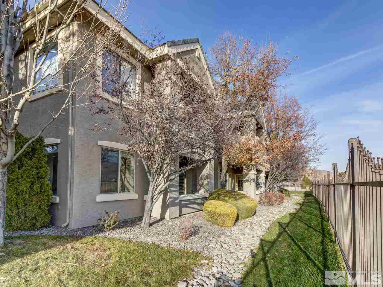 900 South, Unit 3714 Reno, NV 89521 - Photo 19 of 23 a view of a house with a yard