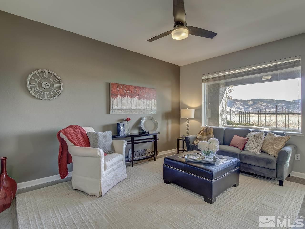 900 South, Unit 3714 Reno, NV 89521 - Photo 5 of 23 a living room with furniture and a window