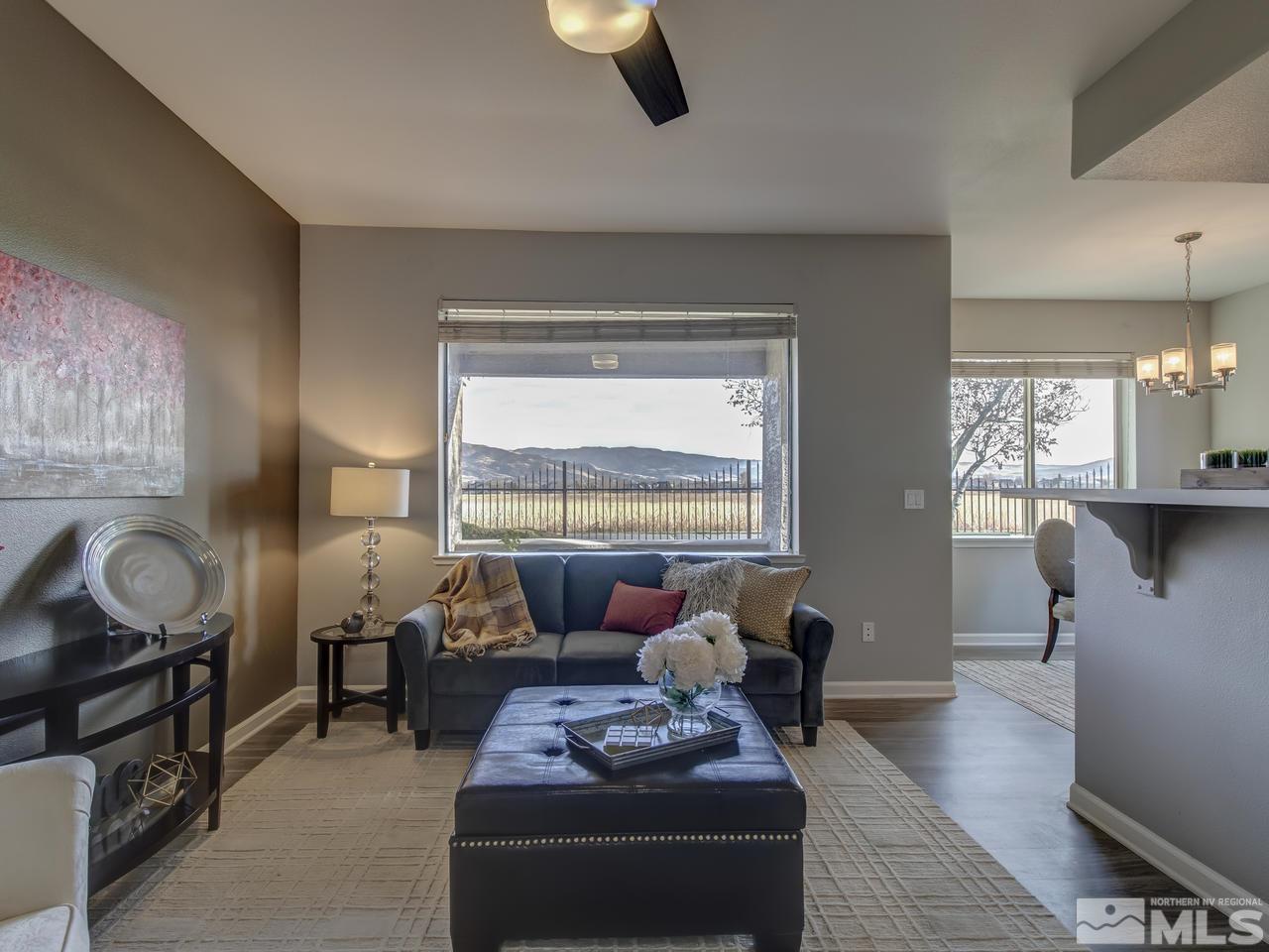900 South, Unit 3714 Reno, NV 89521 - Photo 9 of 23 a living room with furniture and a large window