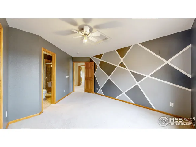 a bathroom with a sink toilet a mirror and shower