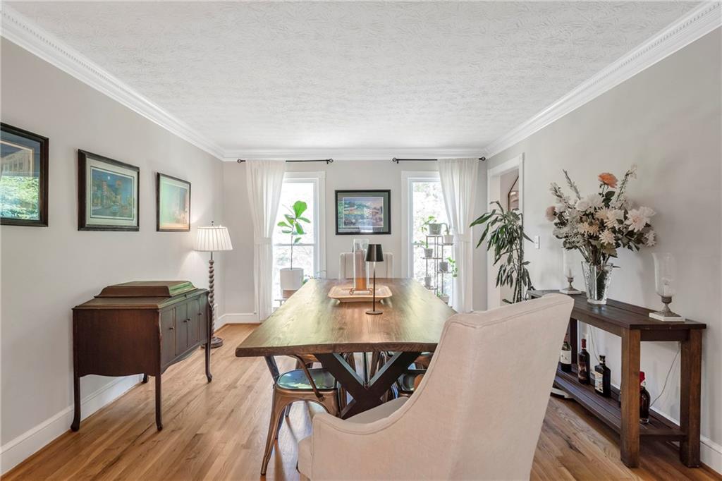 3167 Northbrook Drive Atlanta, GA 30341 - Photo 20 of 53 a view of a dining room with furniture and a potted plant