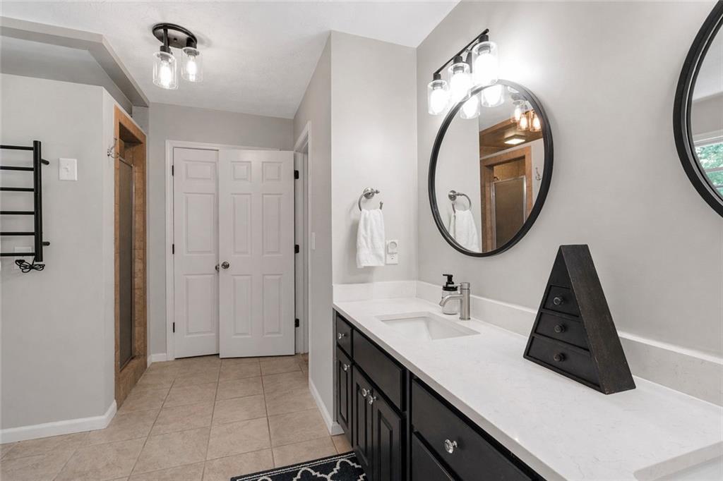 3167 Northbrook Drive Atlanta, GA 30341 - Photo 30 of 53 a bathroom with a sink and a mirror