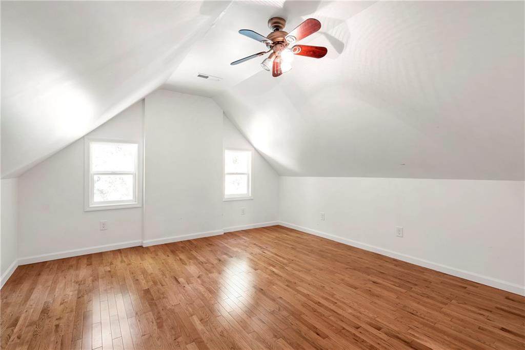 3167 Northbrook Drive Atlanta, GA 30341 - Photo 35 of 53 wooden floor in an empty room with a window