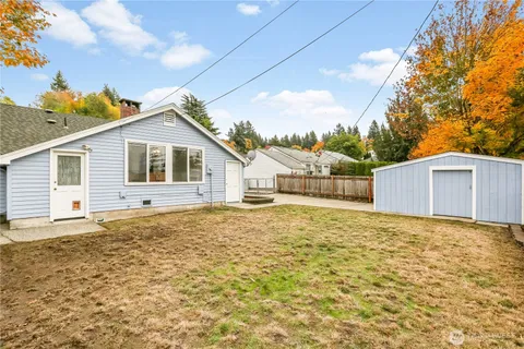 a bathroom with a sink and a yard