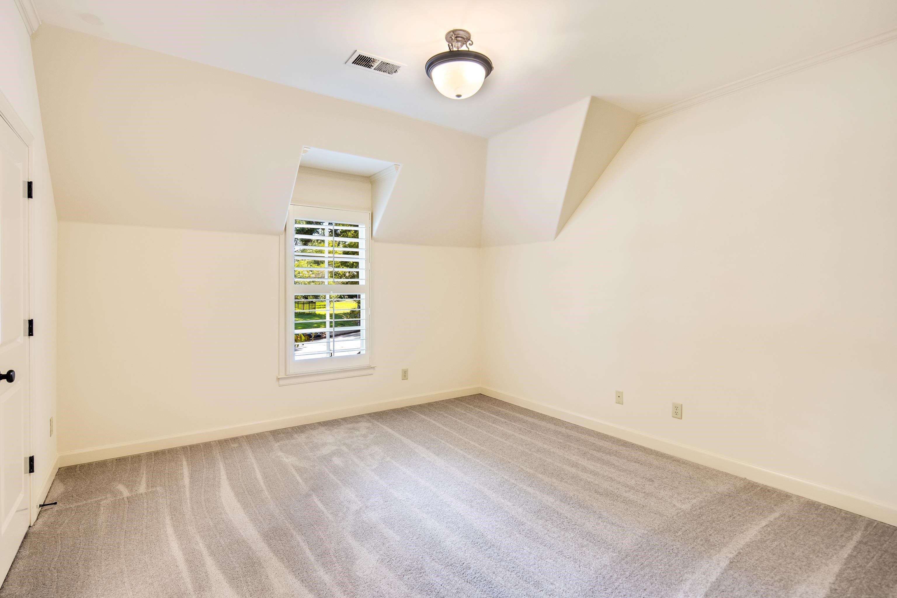 4938 Barfield Road Memphis, TN 38117 - Photo 24 of 40 a view of an empty room with a window