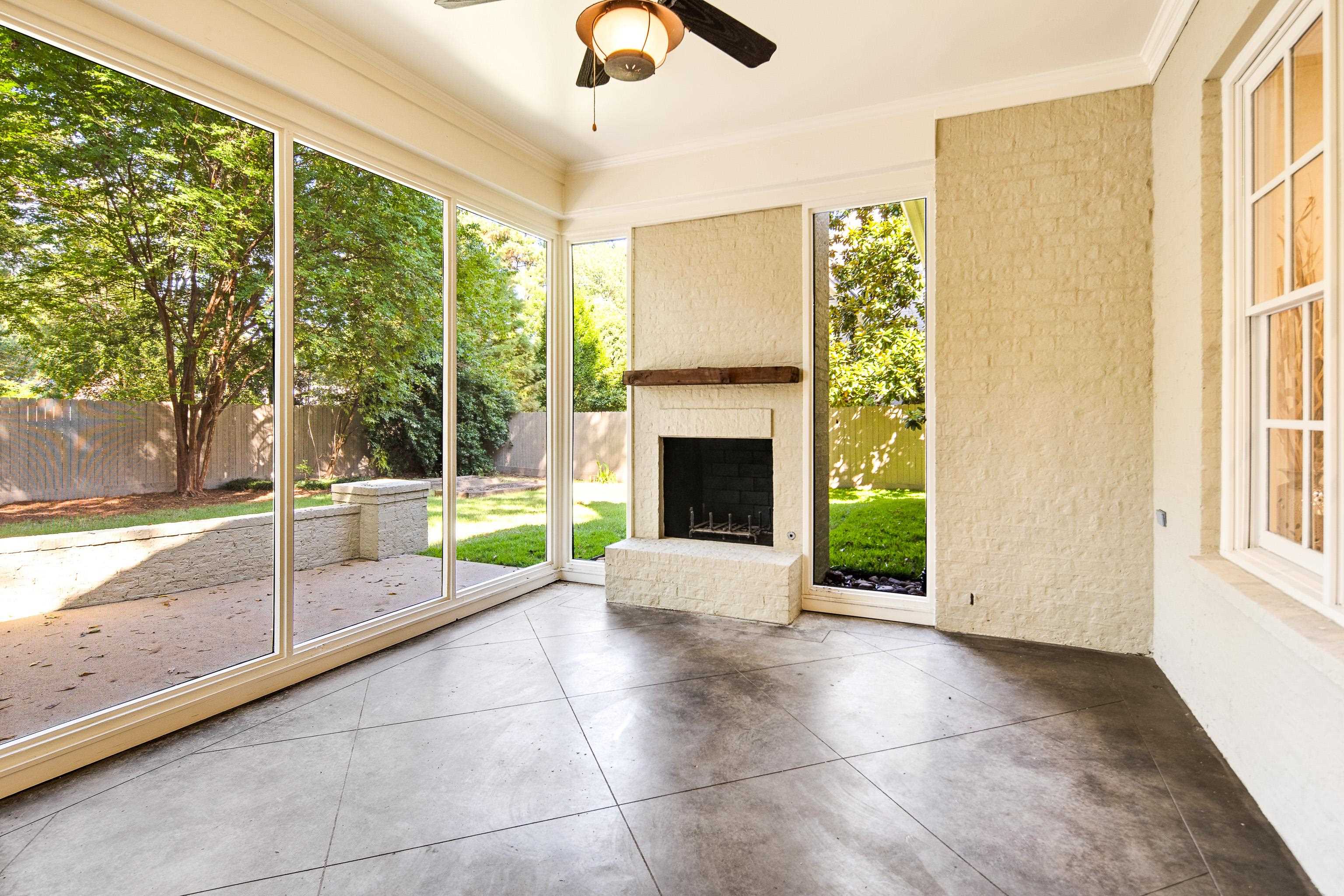 4938 Barfield Road Memphis, TN 38117 - Photo 30 of 40 a view of an empty room with window and fire place