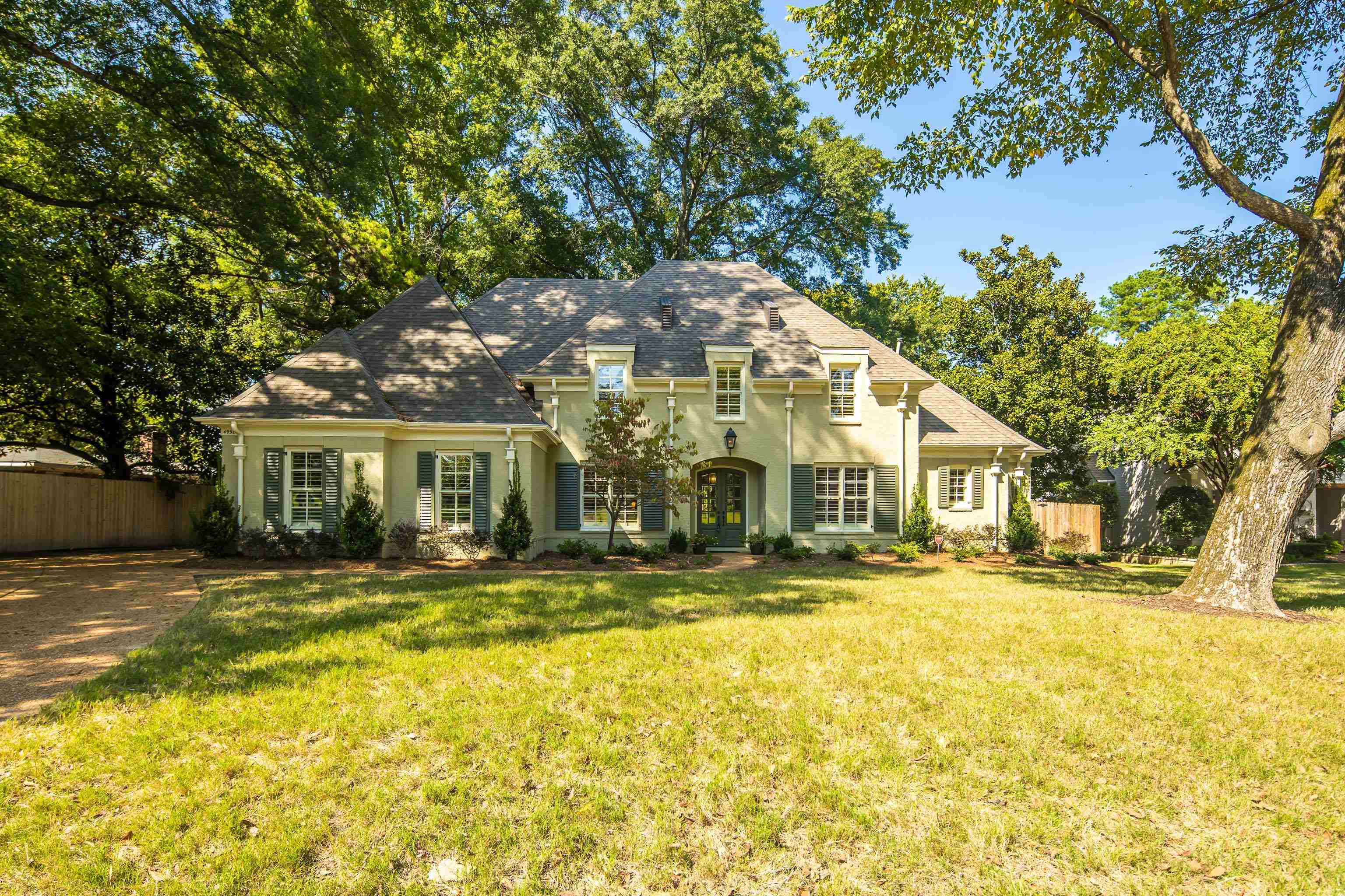 4938 Barfield Road Memphis, TN 38117 - Photo 36 of 40 a front view of a house with a yard