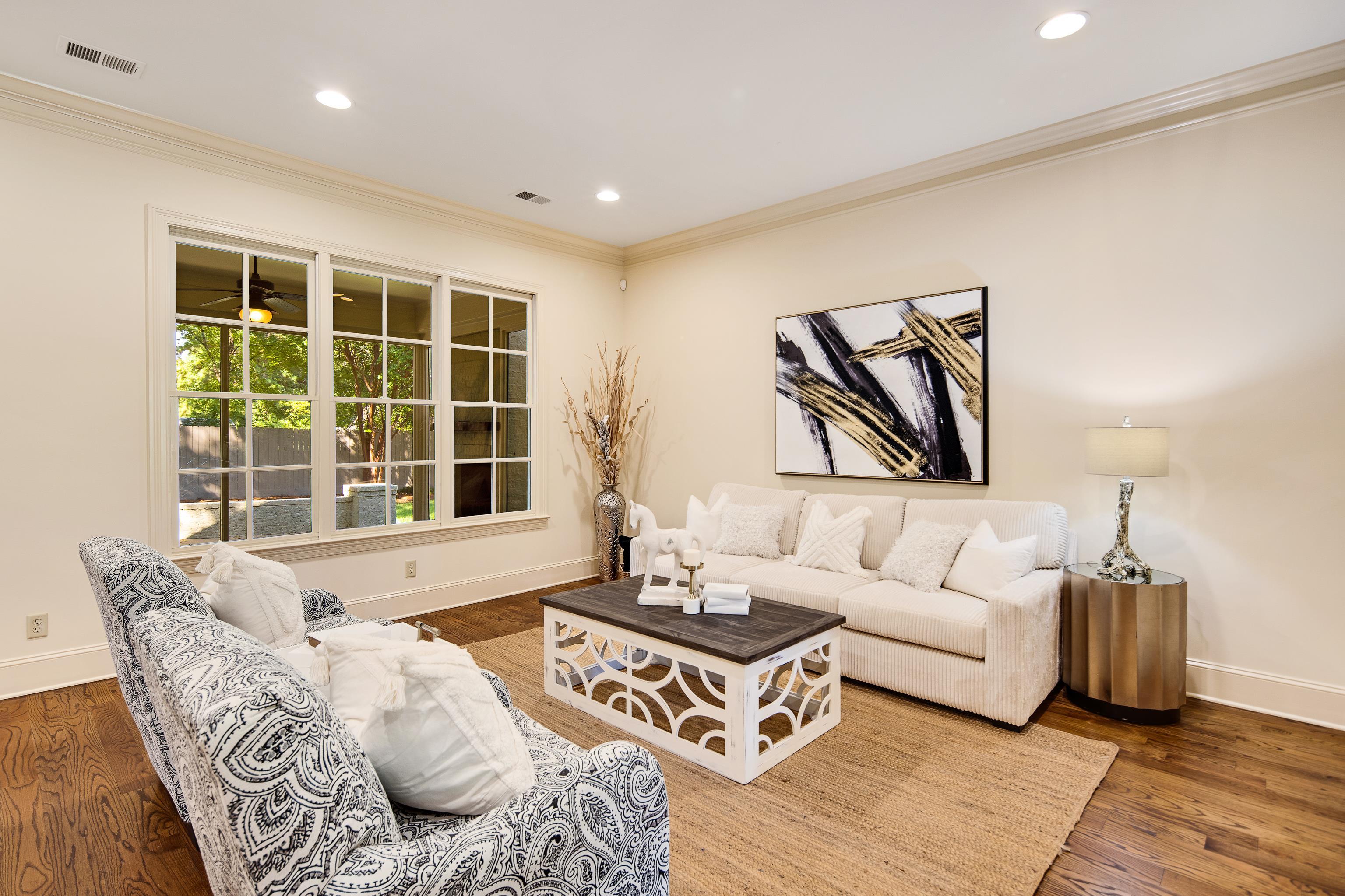 4938 Barfield Road Memphis, TN 38117 - Photo 7 of 40 a living room with furniture and a large window