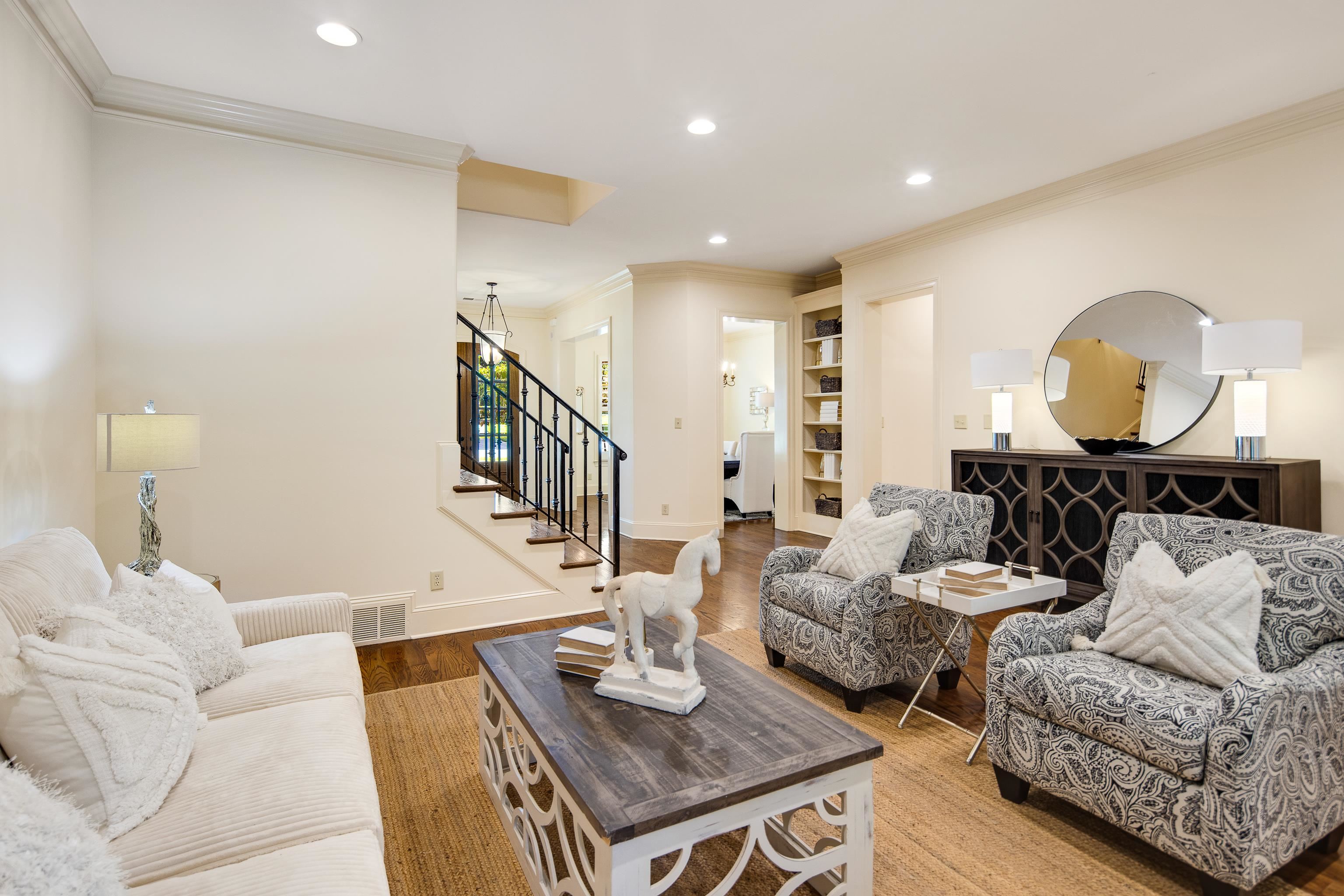 4938 Barfield Road Memphis, TN 38117 - Photo 8 of 40 a living room with furniture and a wooden floor