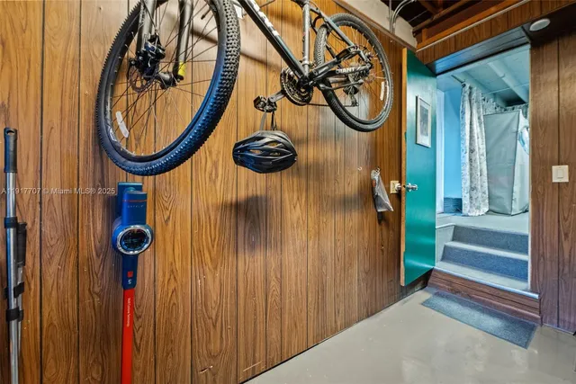 a view of an entryway with a mirror