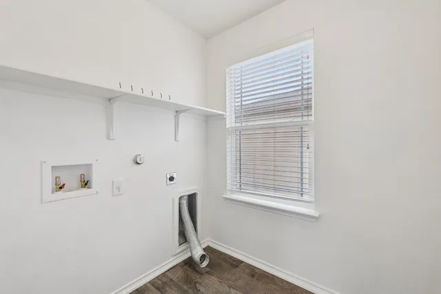 a view of a room with rack on the wall