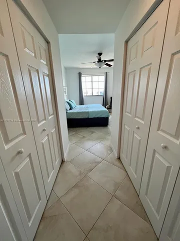 a utility room with sink dryer and washer