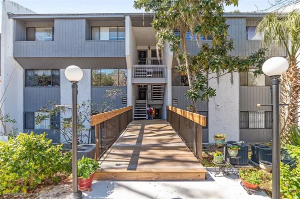 a view of a house with a street
