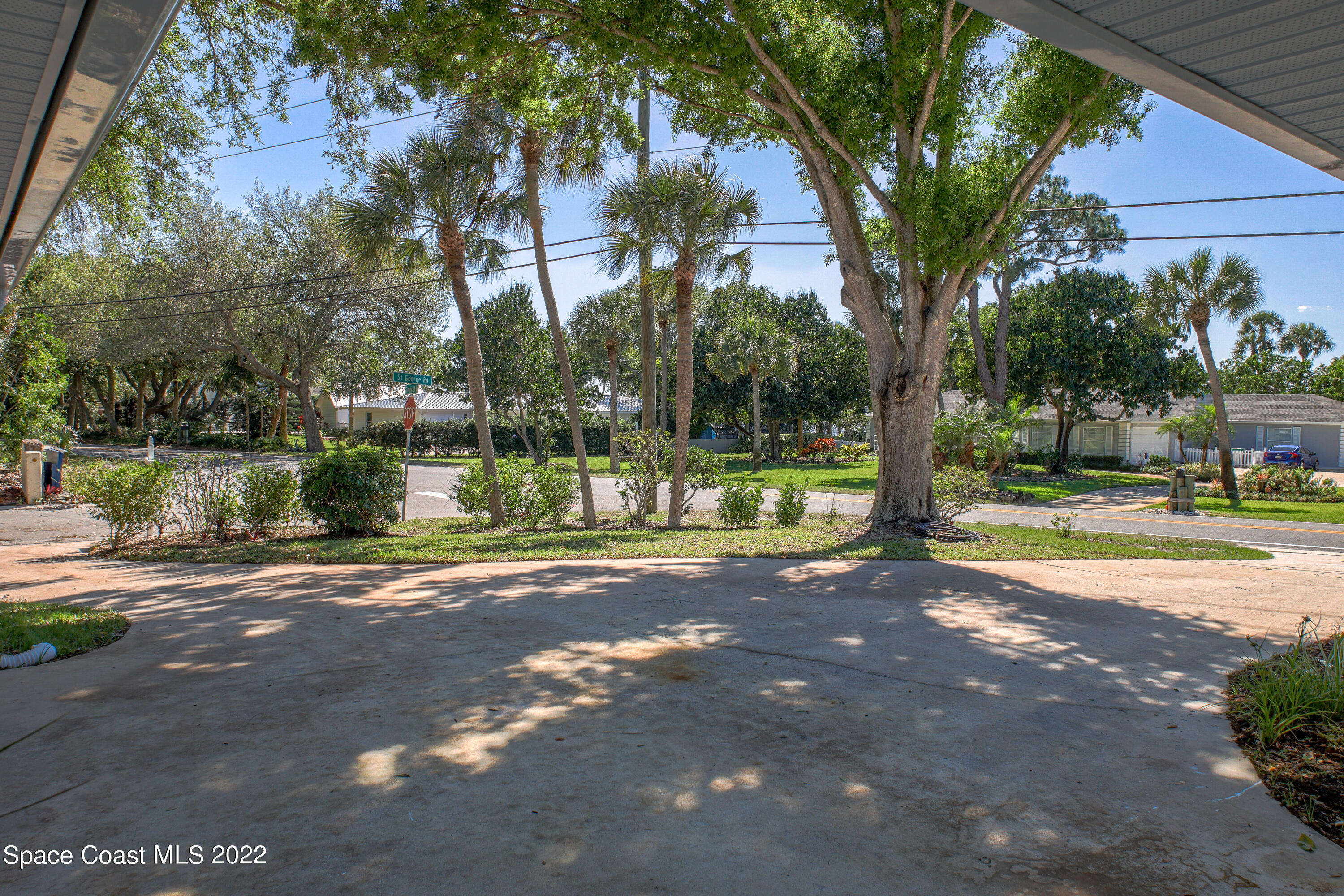 1050 St George Road Merritt Island, FL 32952 - Photo 23 of 24 Front Yard w/Circular Drive