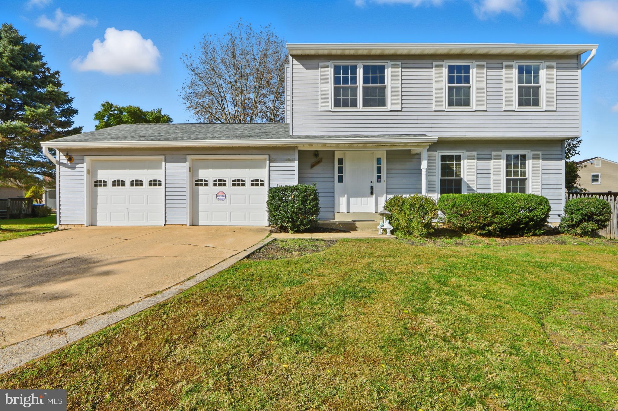 1106 Canyon Road Silver Spring, MD 20904 - Photo 1 of 43 a front view of a house with a yard and garage