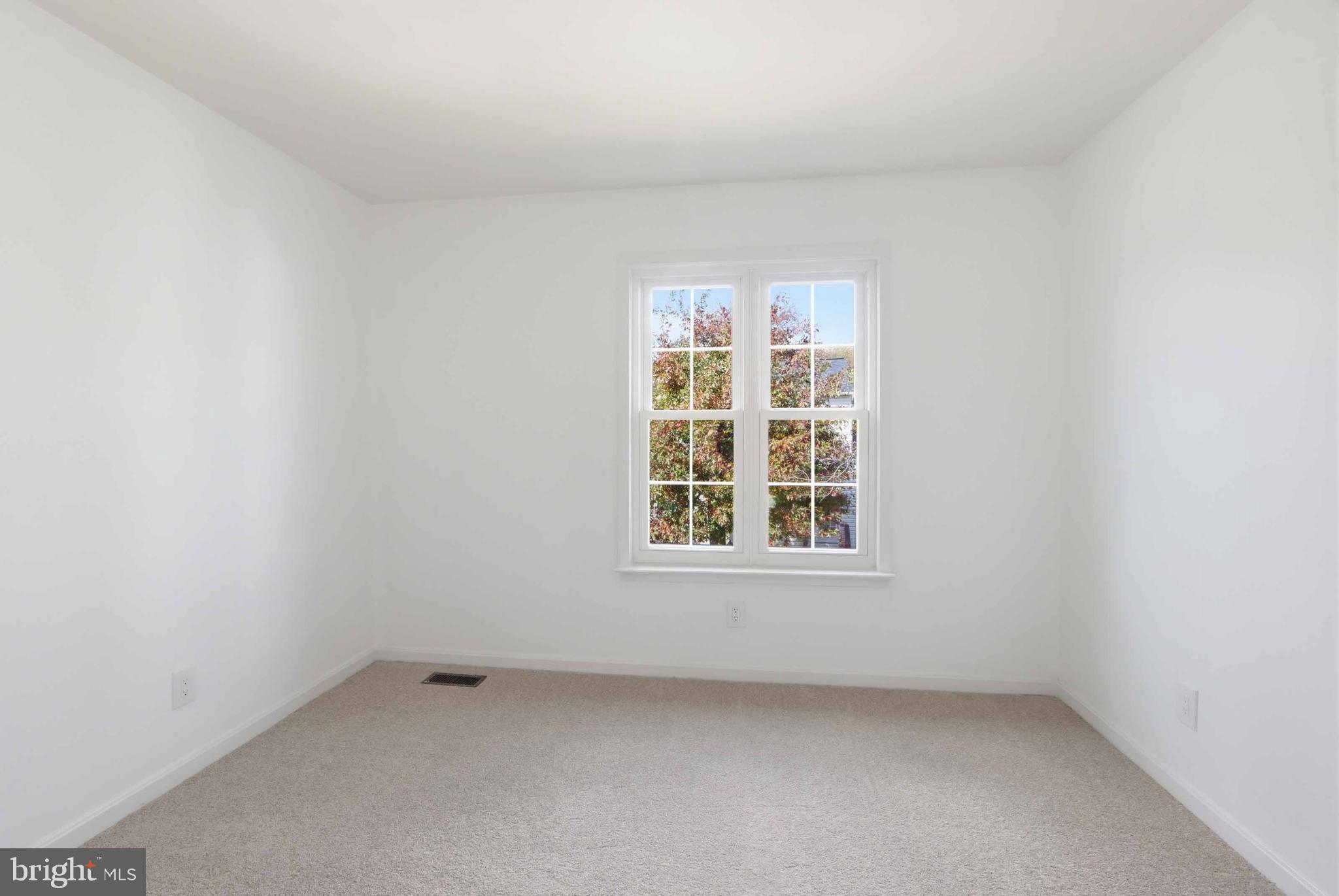 1106 Canyon Road Silver Spring, MD 20904 - Photo 31 of 43 an empty room with a window