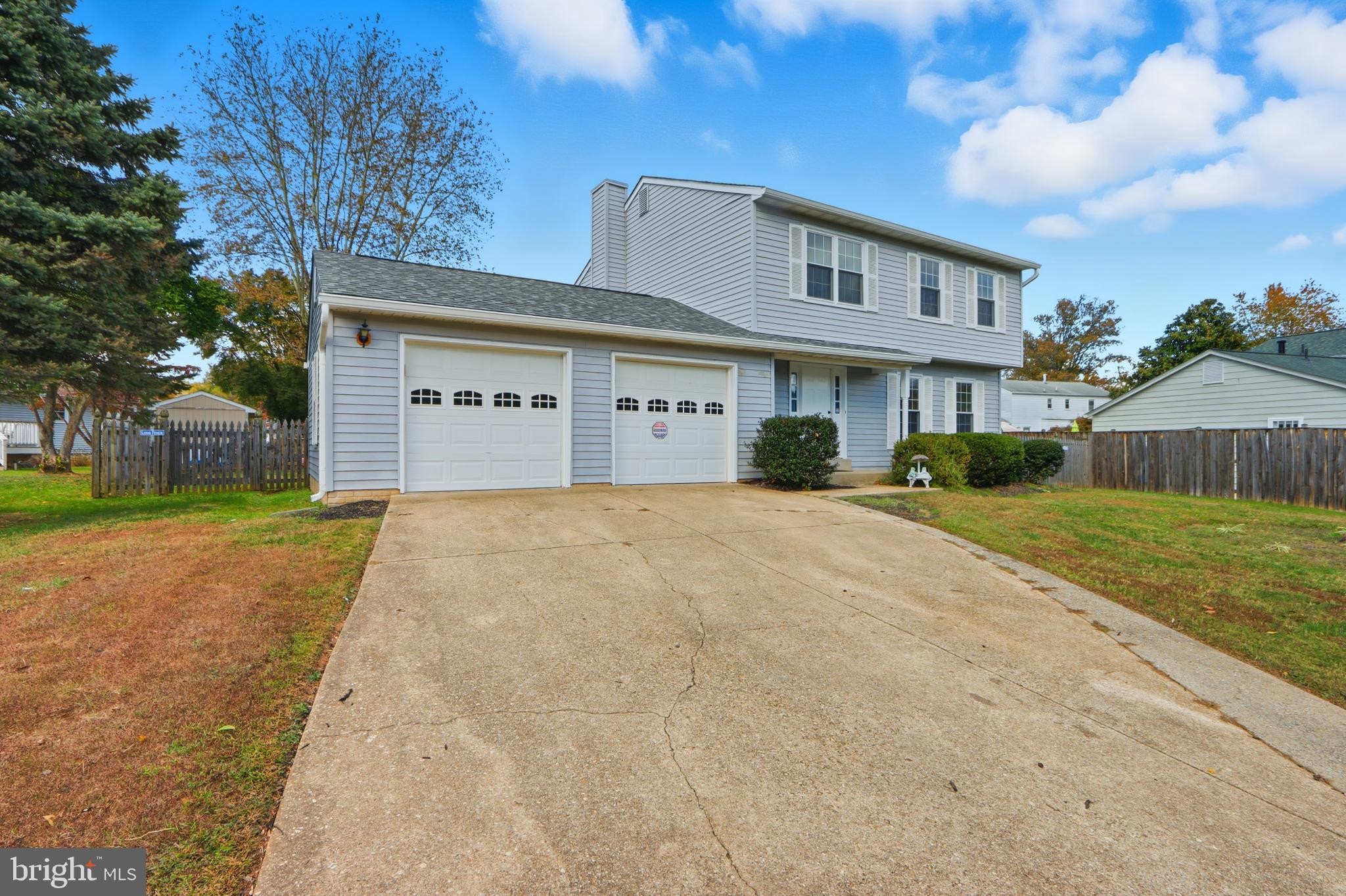 1106 Canyon Road Silver Spring, MD 20904 - Photo 4 of 43 a front view of a house with a yard
