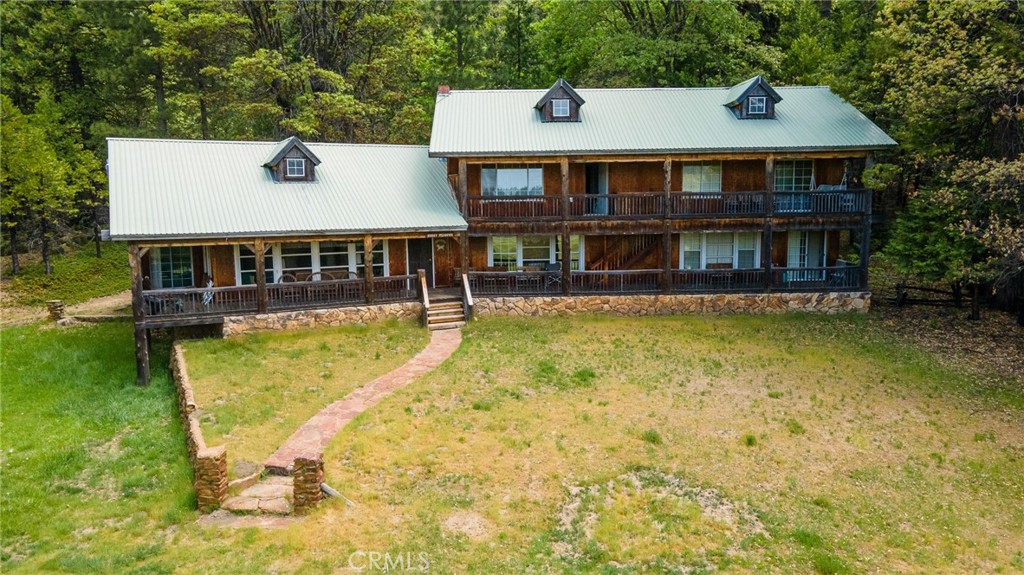 5657 Worman Road Ahwahnee, CA 93601 - Photo 10 of 46 a view of a house with swimming pool