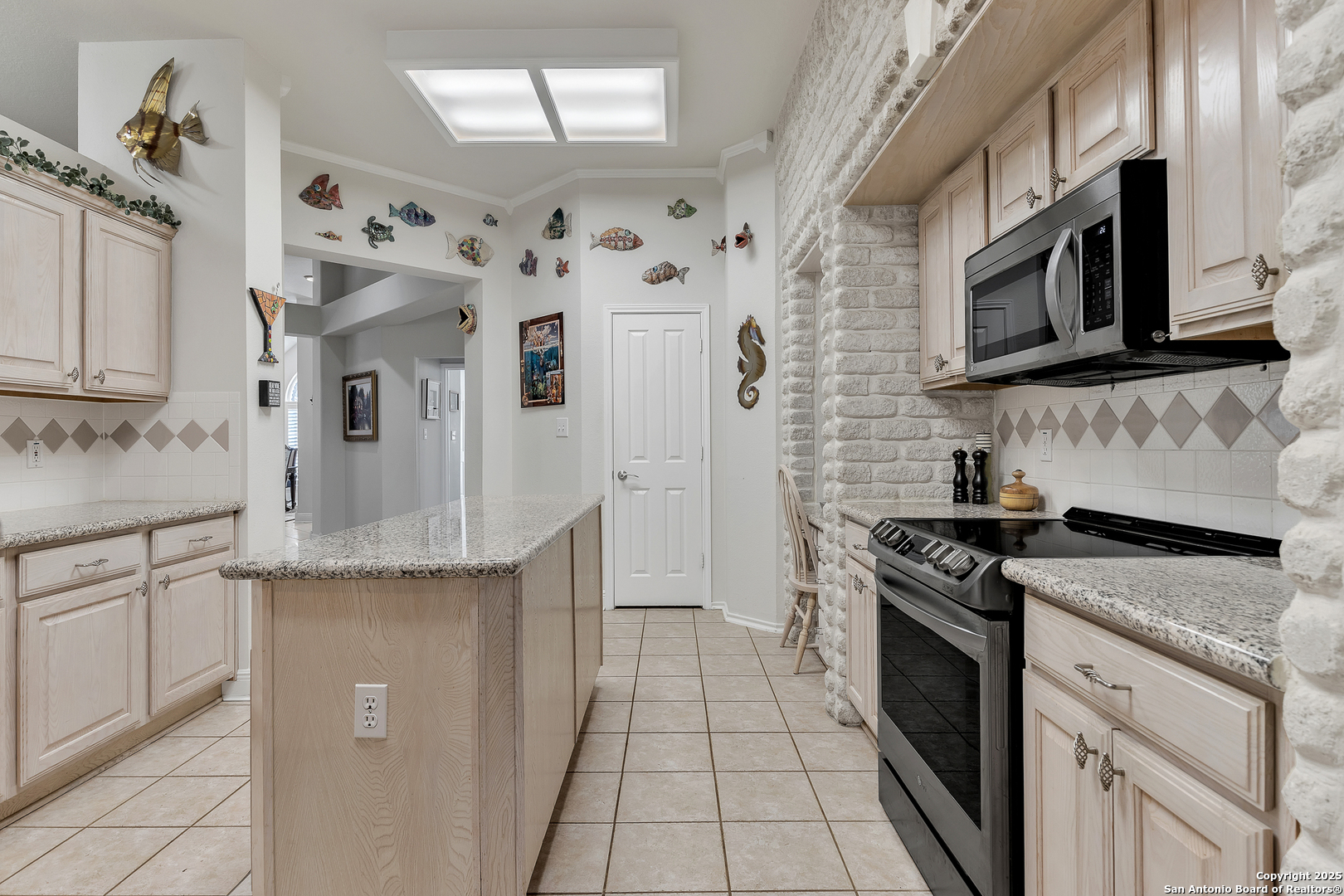 1735 Diamond Ridge San Antonio, TX 78248 - Photo 11 of 33 a kitchen with stainless steel appliances granite countertop a stove and a sink