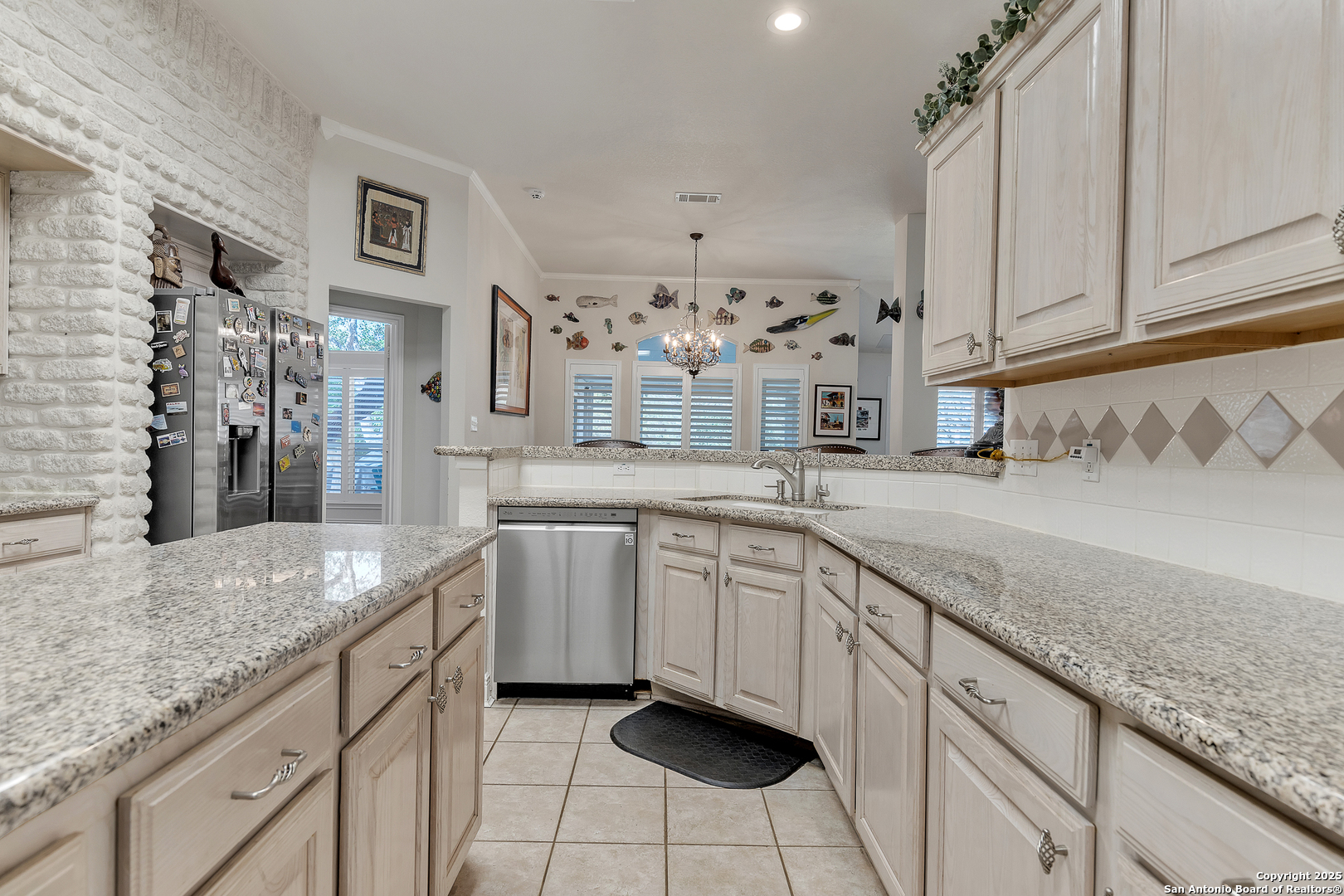 1735 Diamond Ridge San Antonio, TX 78248 - Photo 12 of 33 a kitchen with granite countertop stainless steel appliances sink and cabinets
