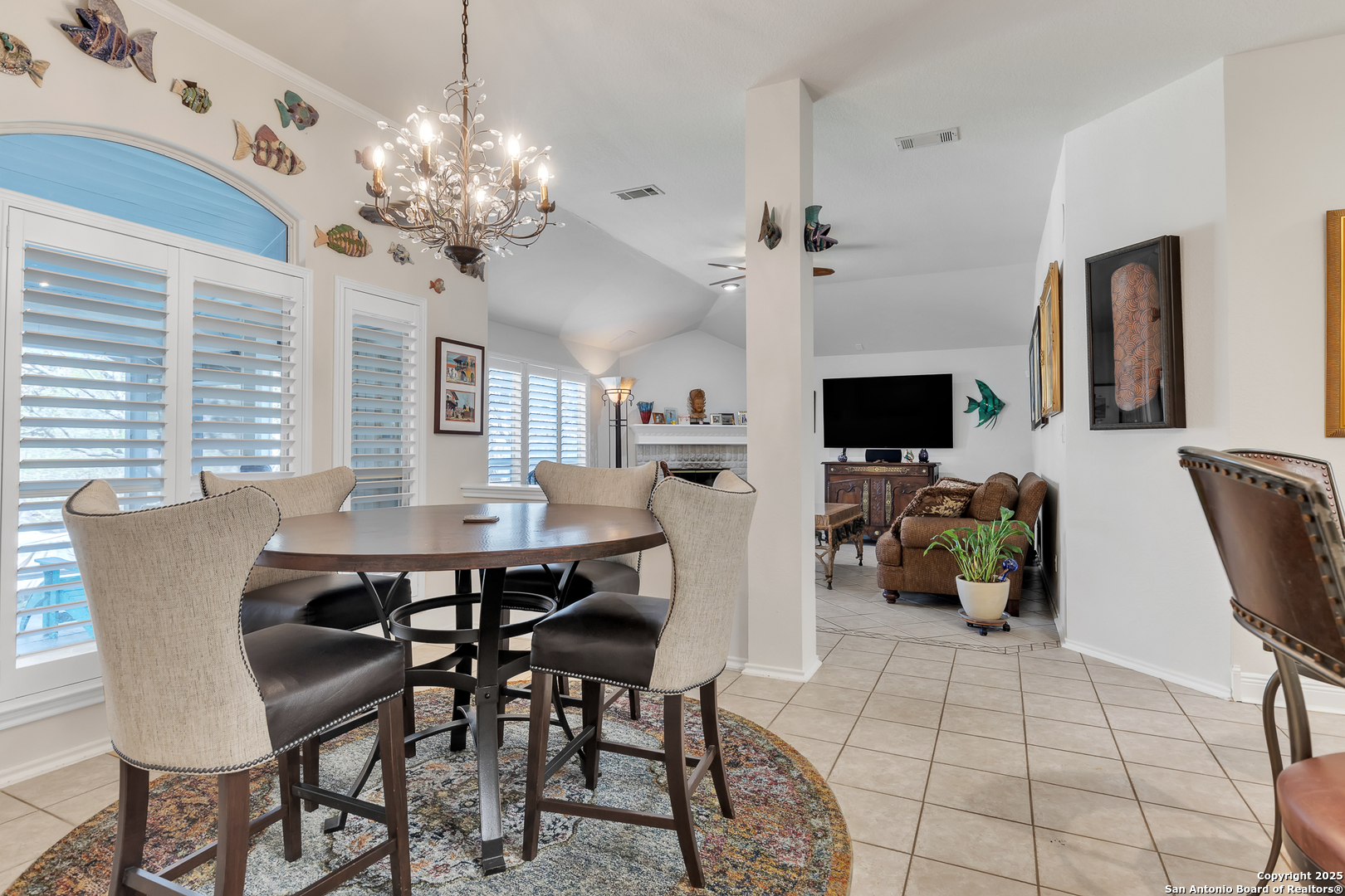 1735 Diamond Ridge San Antonio, TX 78248 - Photo 16 of 33 a view of a dining room with furniture and chandelier