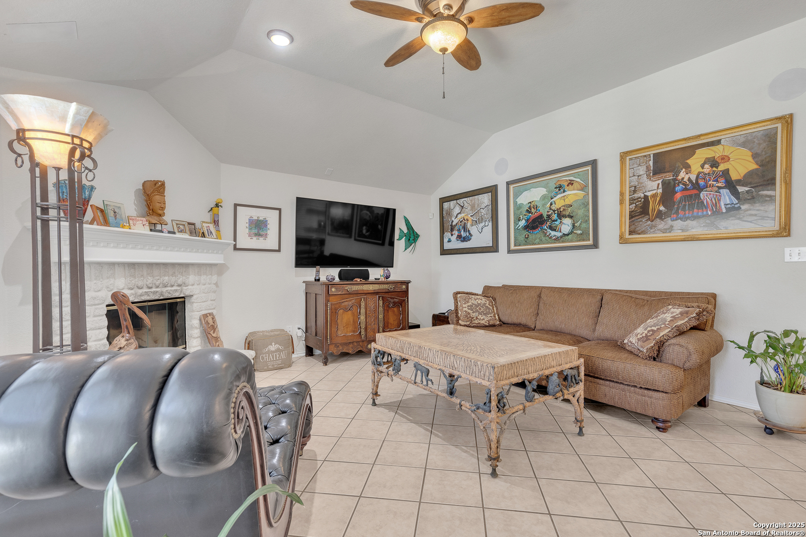 1735 Diamond Ridge San Antonio, TX 78248 - Photo 17 of 33 a living room with furniture and a fireplace